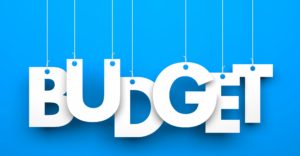 Text image with hanging letters that spell "BUDGET" related to marketing technology