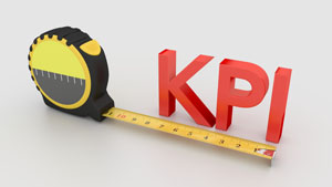 Text image that reads 'KPI' with a tape measure