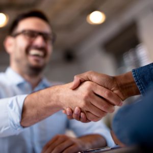 image of two business men shaking hands
